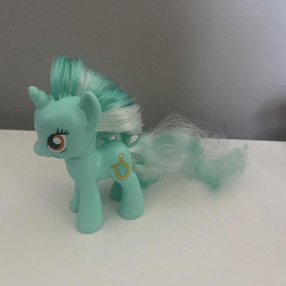 Pop-mart Green and Blue Collectibles